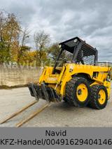 Komatsu SK714 Only 1600 H Palettengabel und Schaufel - Angebote