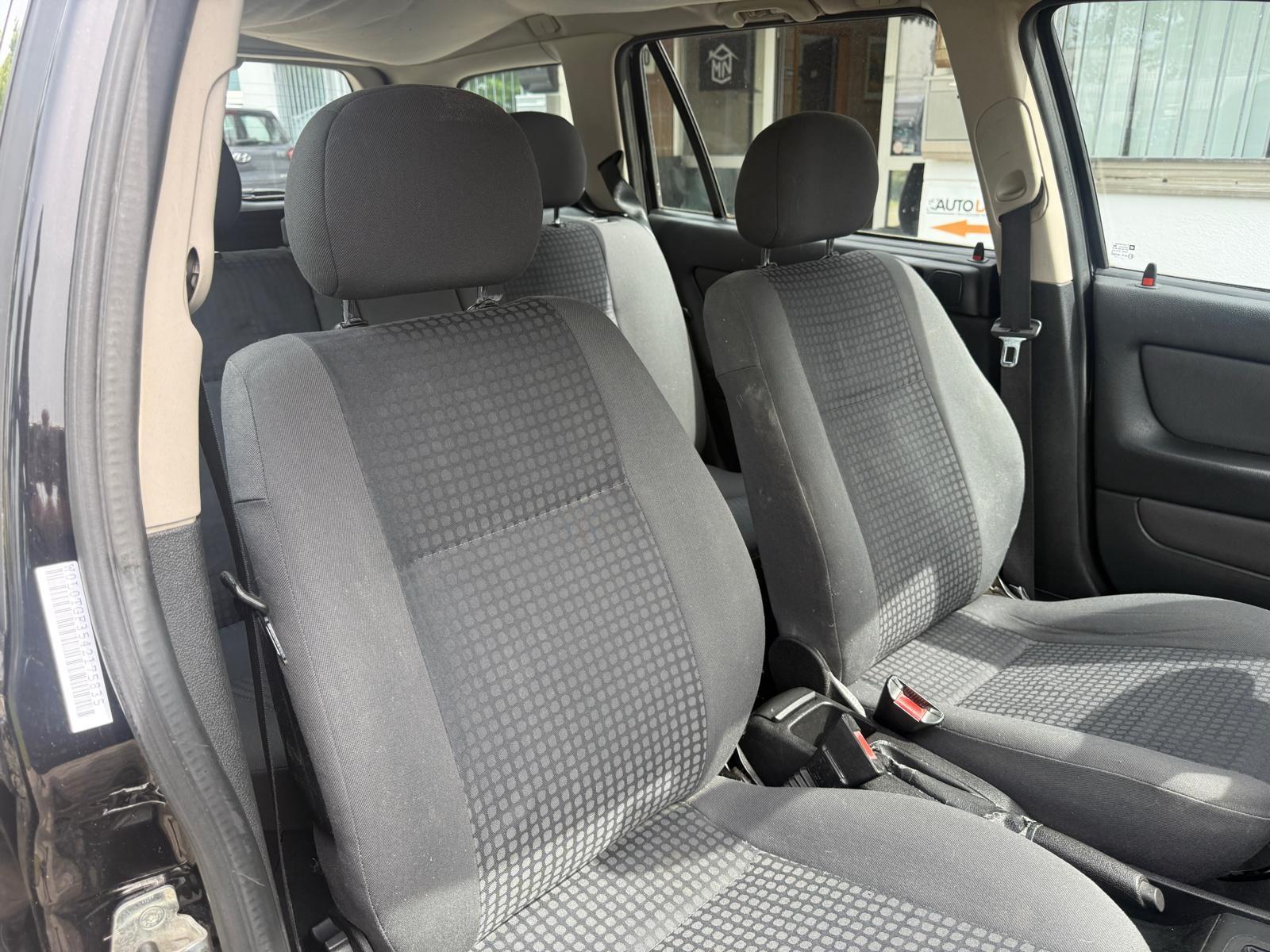 Opel Astra 2004 — photo 13