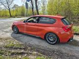 BMW M135i - - BMW: Orange