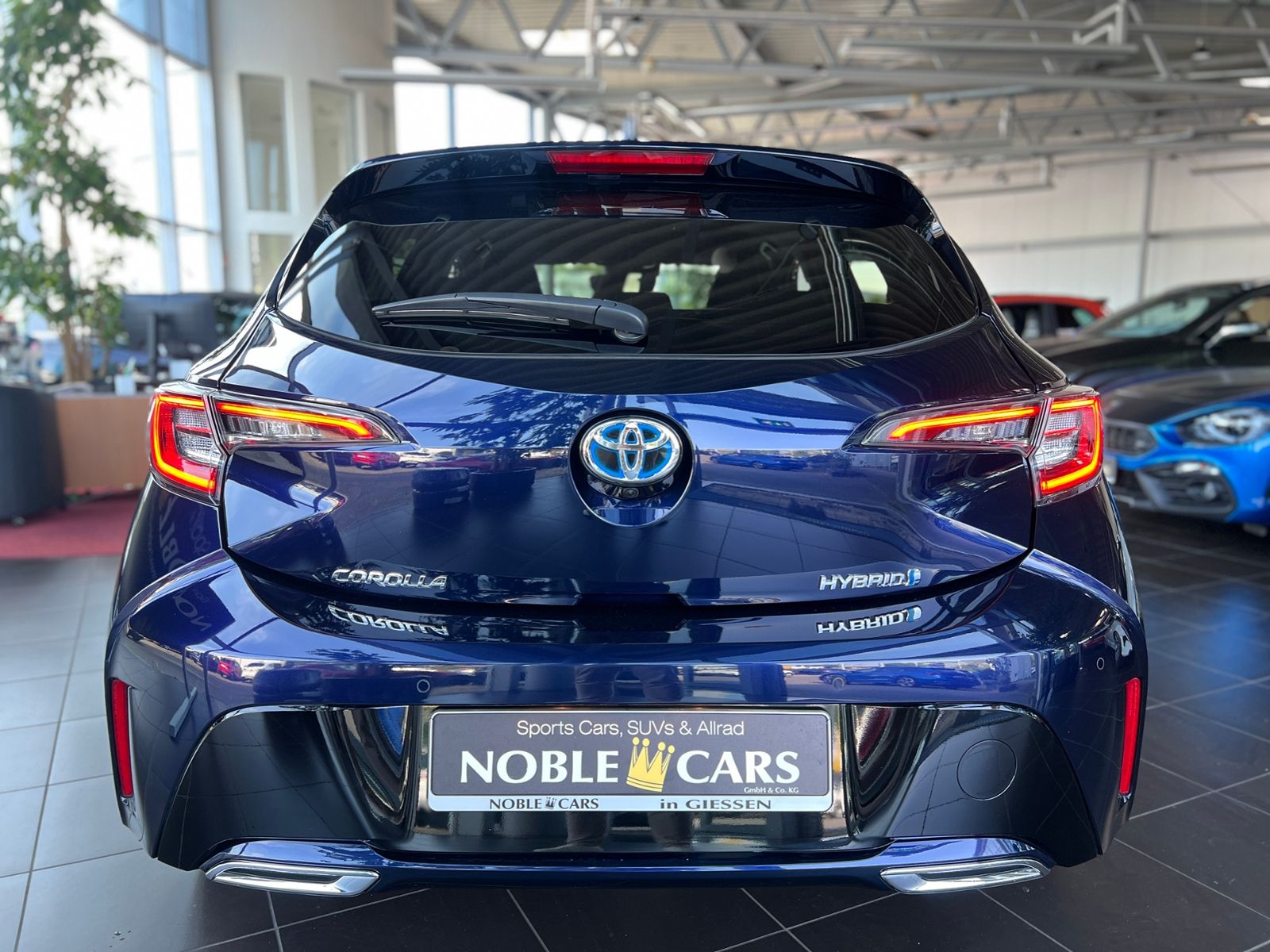 Fahrzeugabbildung Toyota Corolla 2.0 Hybrid Team D JBL LED RFK NAVI SHZ