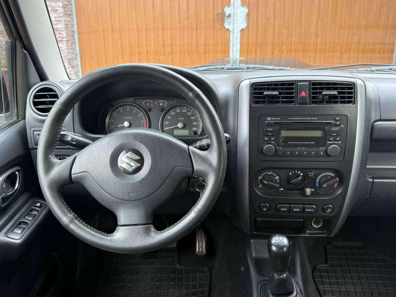 Suzuki Jimny 1.4 86ch - 2 ème main - Climatisation - CT récent - Attelage