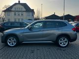 BMW X1 18 i sDrive Automatik *KLIMA*NAVI*SHZ* - BMW Gebrauchtwagen von 2011