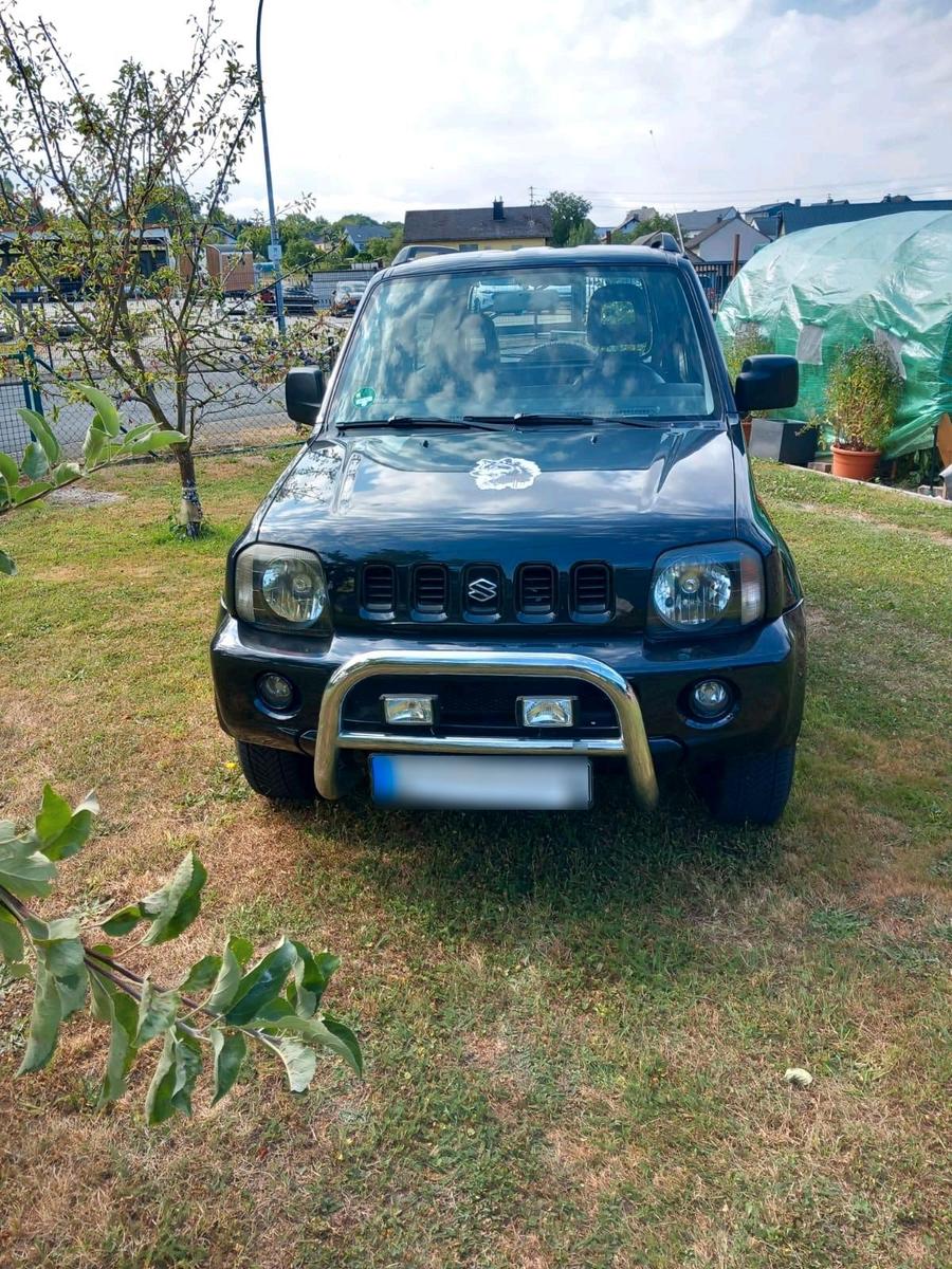 Suzuki Jimny 2004 — engine 80 HP (59kW)