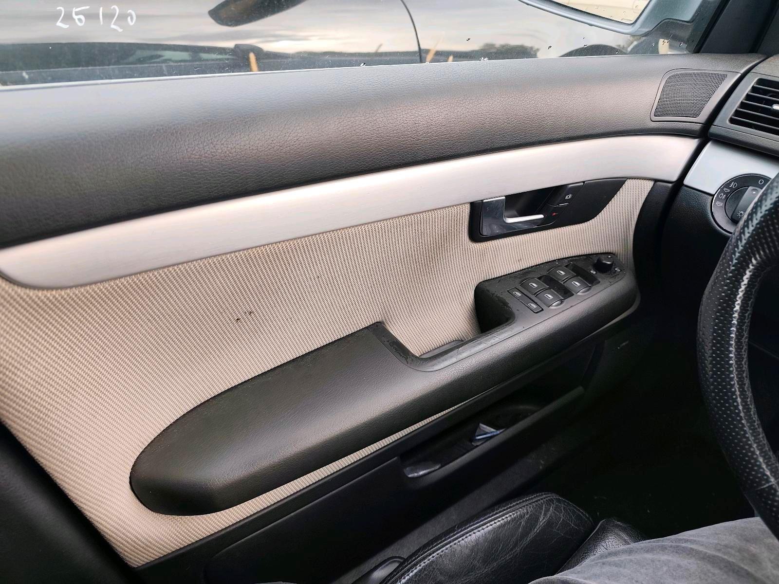 Audi A4 2004 — photo 11
