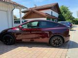 Tesla 2024 Model Y Long Range RWD mit 622KM Reichweite - rote Tesla Model Y