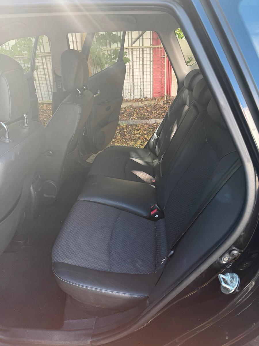 Kia cee'd 2010 — photo 7