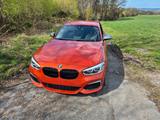 BMW M135i - - BMW: Orange