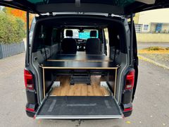 Kosi Busse Ostbayerns größter VW Bus und VW Bus Camping Experte. Ihr VW Bus Händler, VW Bus Camper Ausbau / Umbau und Fahrzeugservice in unserer Bulli Werkstatt Fahrzeugabbildung Volkswagen T6 Kosi California DSG 4Motion - UNIKAT!