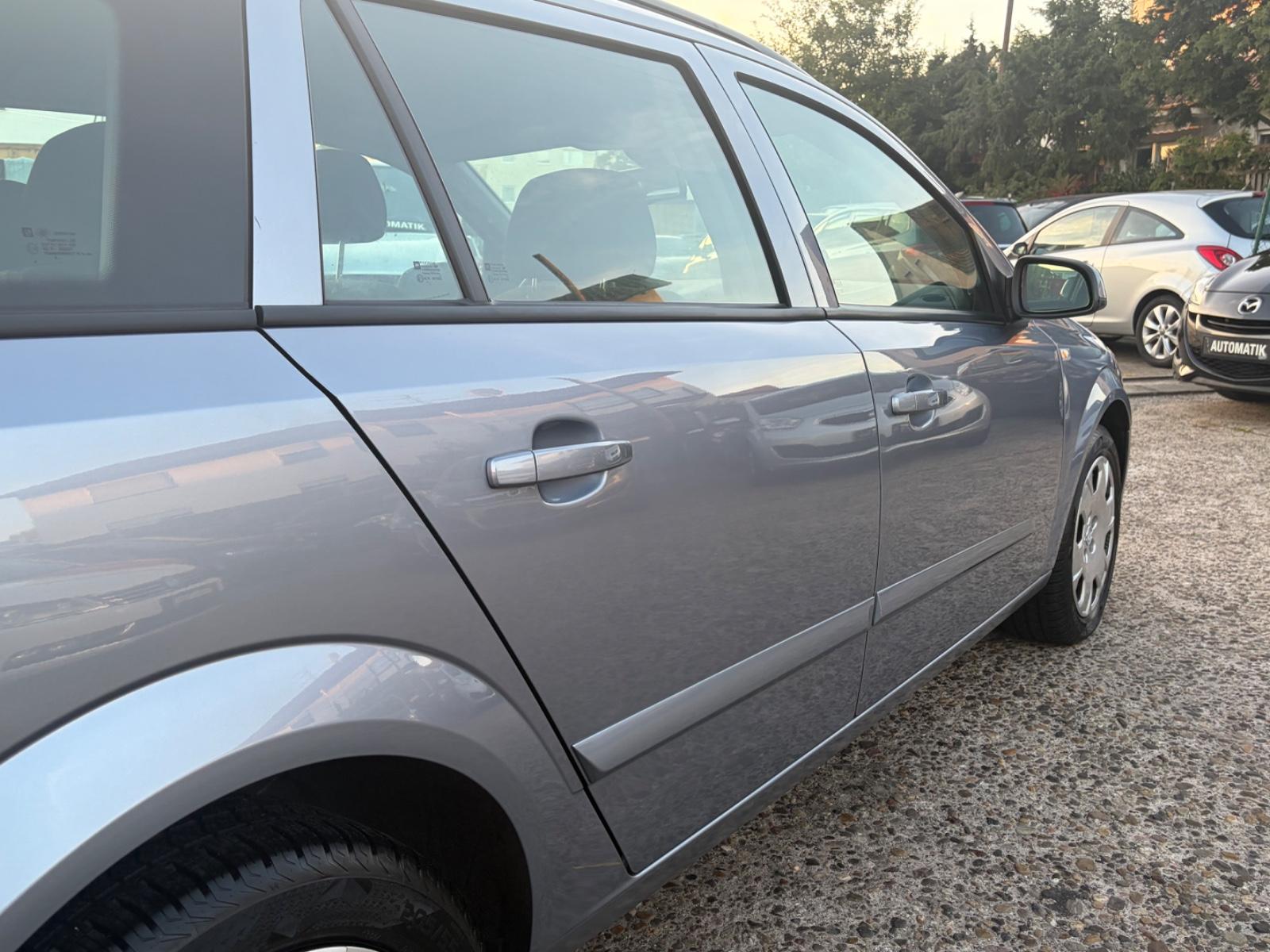 Opel Astra 2004 — photo 20