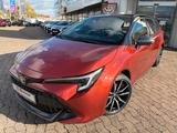 Toyota Corolla TS 2.0 Hybrid GR Sport - mit Hybrid-Antrieb: Orange, Kombi