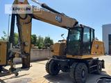 CAT M320F - CAT Mobilbagger M320