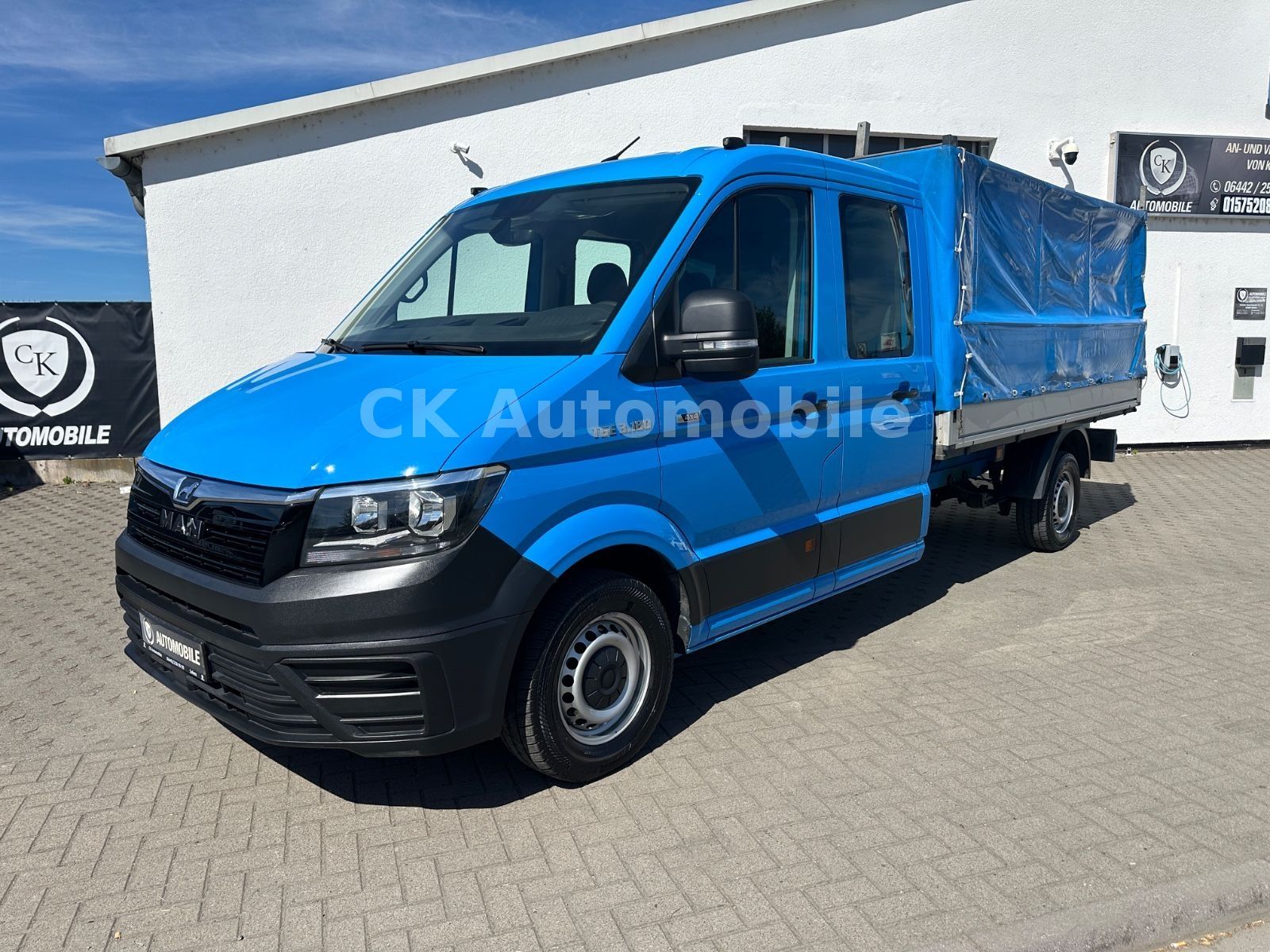 Fahrzeugabbildung MAN TGE 3.180 DoKa Pritsche/Plane 4X4/6 Sitze/AHK