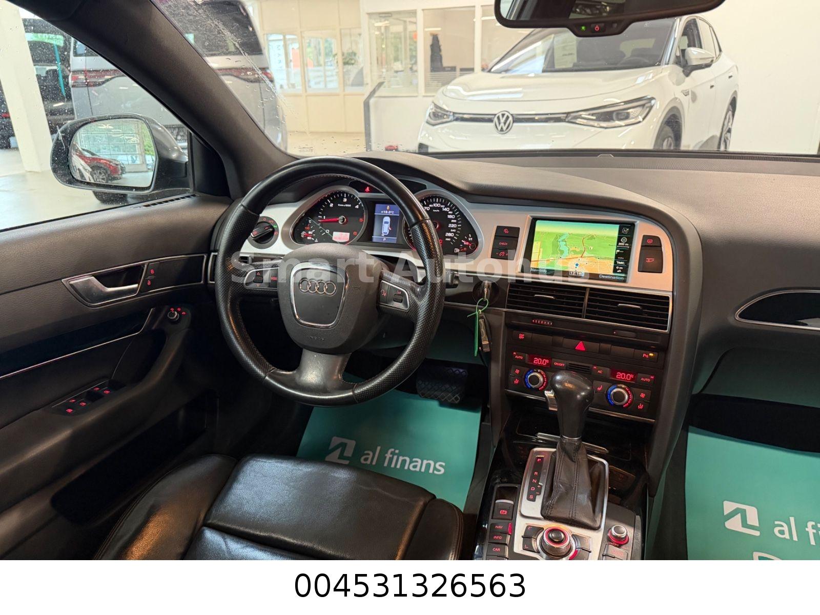 Audi A6 2009 — photo 15