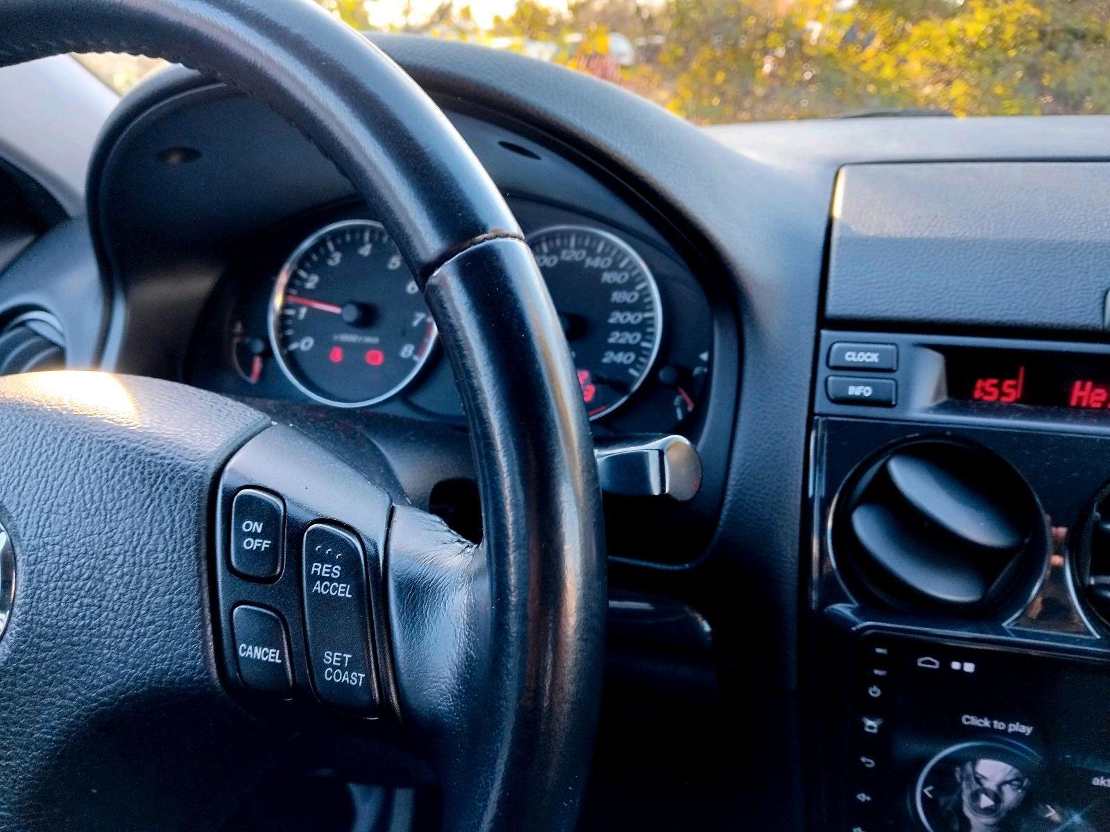 Mazda 2 2005 — photo 13