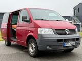 Volkswagen T5 | Camper Umbau - rote Volkswagen T5 Caravelle