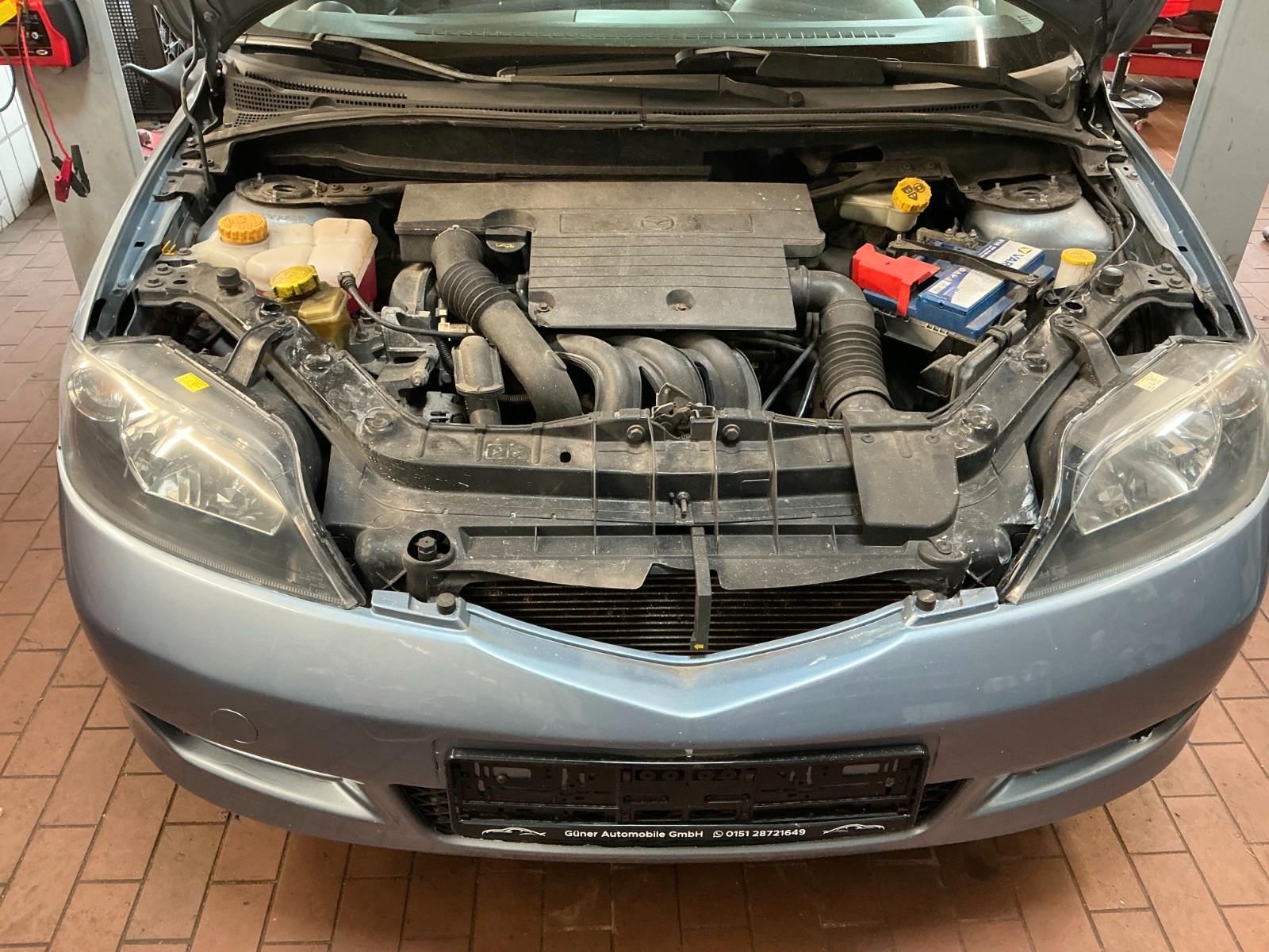 Mazda 2 2005 — photo 14