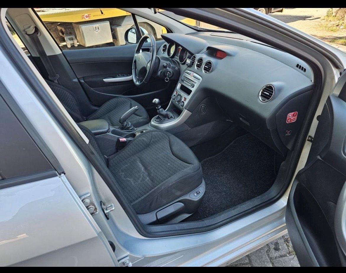 Peugeot 308 2009 — photo 7