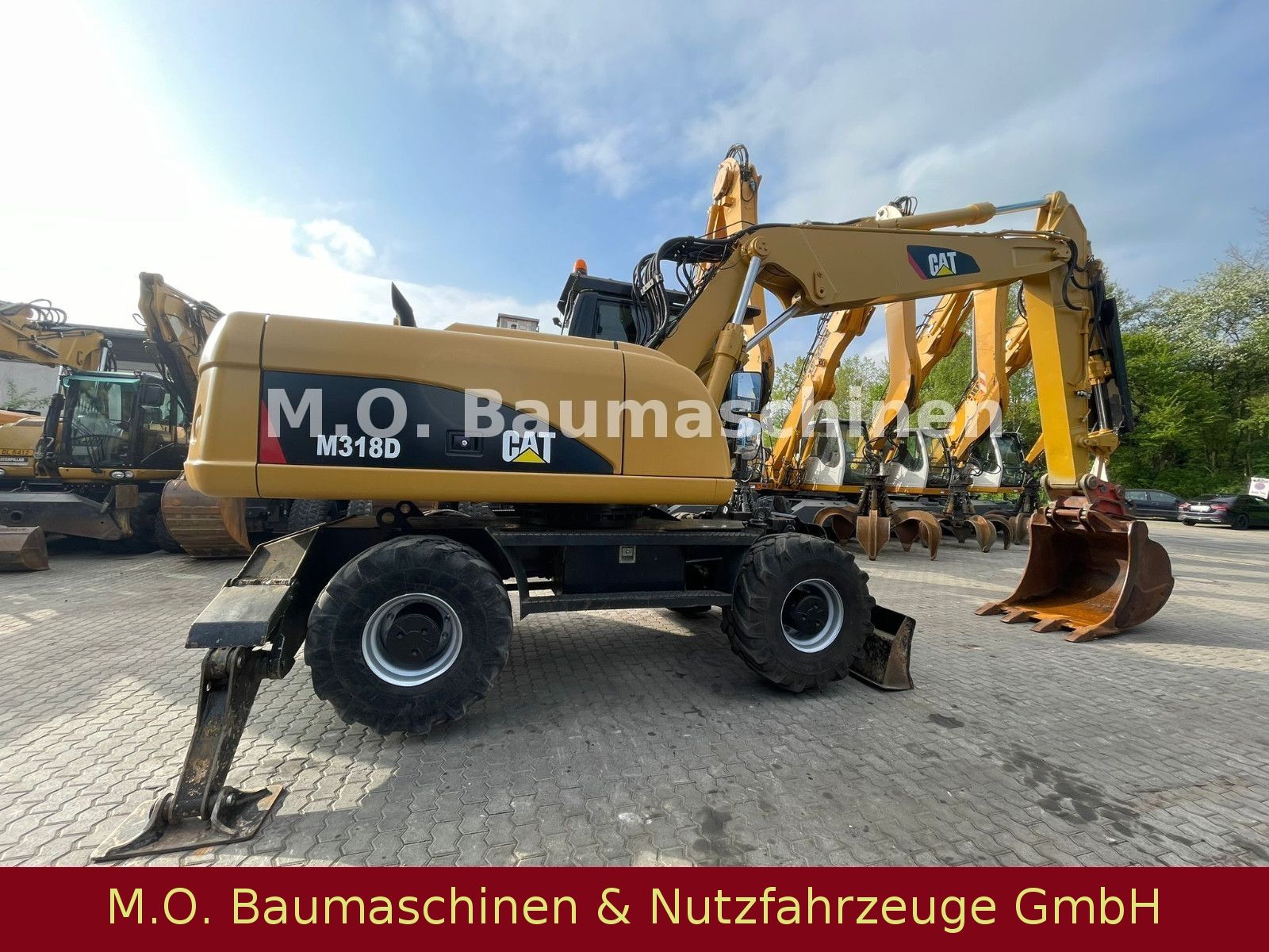 Fahrzeugabbildung CAT M 318 D  / SW /Hammerline + Hammer/ VSA / AC /