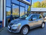 Suzuki SX4 Style*PDC*Klima*Navi*nur 46.500 km! - Suzuki SX4: Allradantrieb