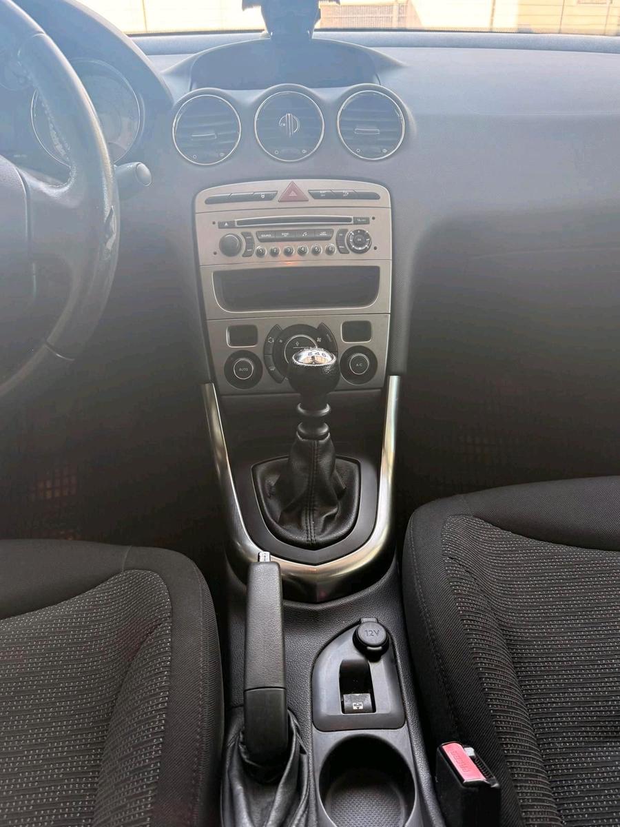Peugeot 308 2010 — photo 12
