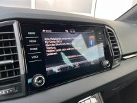 Skoda Karoq 1.5 TSI DSG Sportline NAV AHK MATRIX 5JGAR bei Autohaus Landmann & Maier OHG