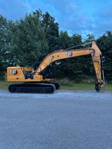CAT 323 Kettenbagger  OQ70/55 - Angebote