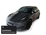 Tesla Model Y Rear-Wheel Drive - silberne Tesla Model Y
