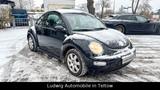 Volkswagen New Beetle 1.6 - Volkswagen New Beetle mit Benzin-Antrieb: Limousine, 1.6