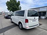 Volkswagen T6.1 Caravelle DSG 4M/8-Si/Kam/2xSchiebetü/STHZ - weiße Volkswagen T6 Caravelle