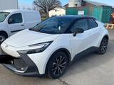 Toyota C-HR 1.8-l-VVT-i Hybrid Team Deutschland Tea... - gebrauchte Toyota C-HR aus dem Jahr 2023