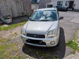Subaru Justy G3X  - silberne Subaru Justy