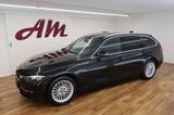 BMW 320 Baureihe 3 Touring 320 i - BMW 320 mit Benzin-Antrieb: Schwarz