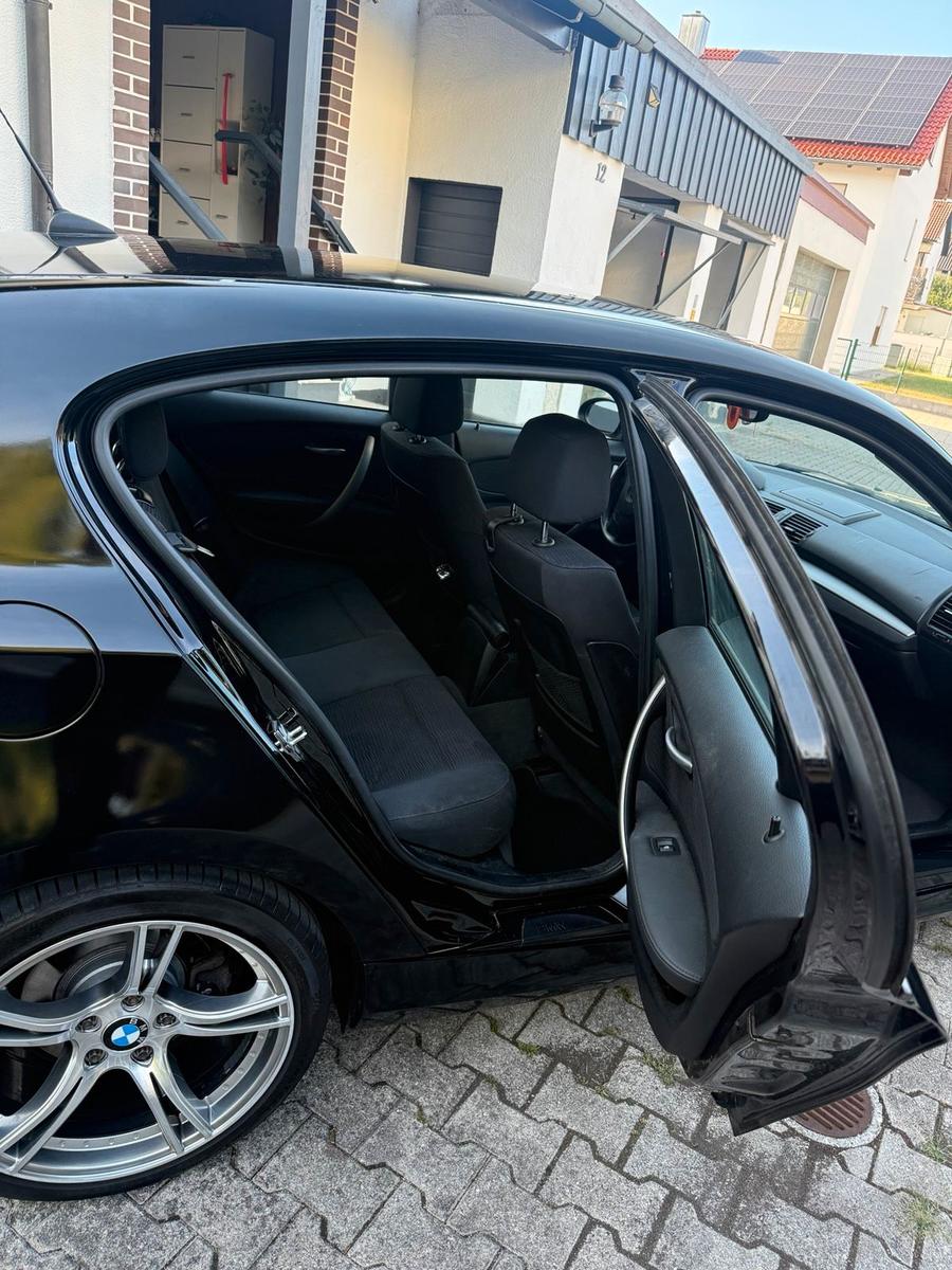 BMW 118 2009 — photo 7