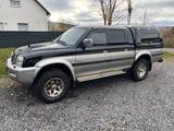 Mitsubishi L200 K60T - gebrauchte Mitsubishi L200 aus dem Jahr 2003