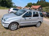 Subaru Justy 1.3 - - graue Subaru Justy