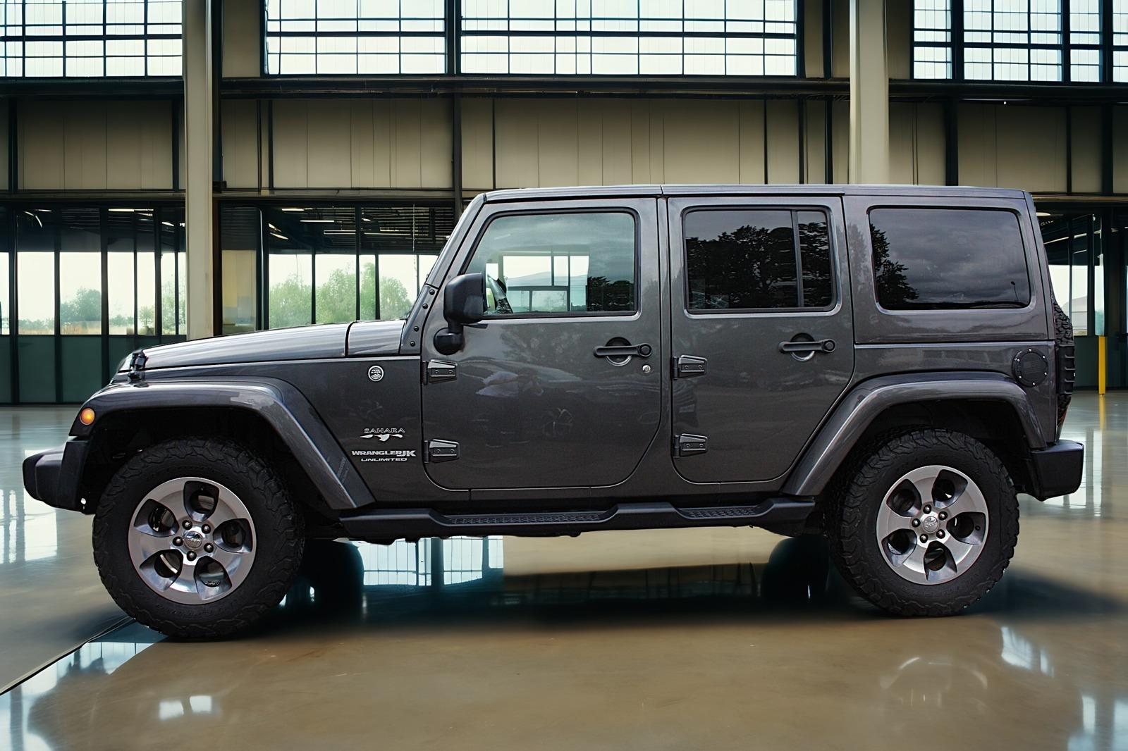 JEEP WRANGLER 2.8 SAHARA AUTO. GPS / CUIR / ATTELAGE / LED | 200 ch | 4X4 | ATTELAGE FIXE | PANORAMA | SELLERIE CUIR