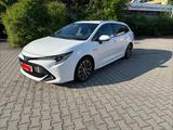 Toyota Corolla 1,8 Hybrid Team Deutschl Touring Spo... - Toyota Corolla mit Benzin-Antrieb: Kombi, Automatik