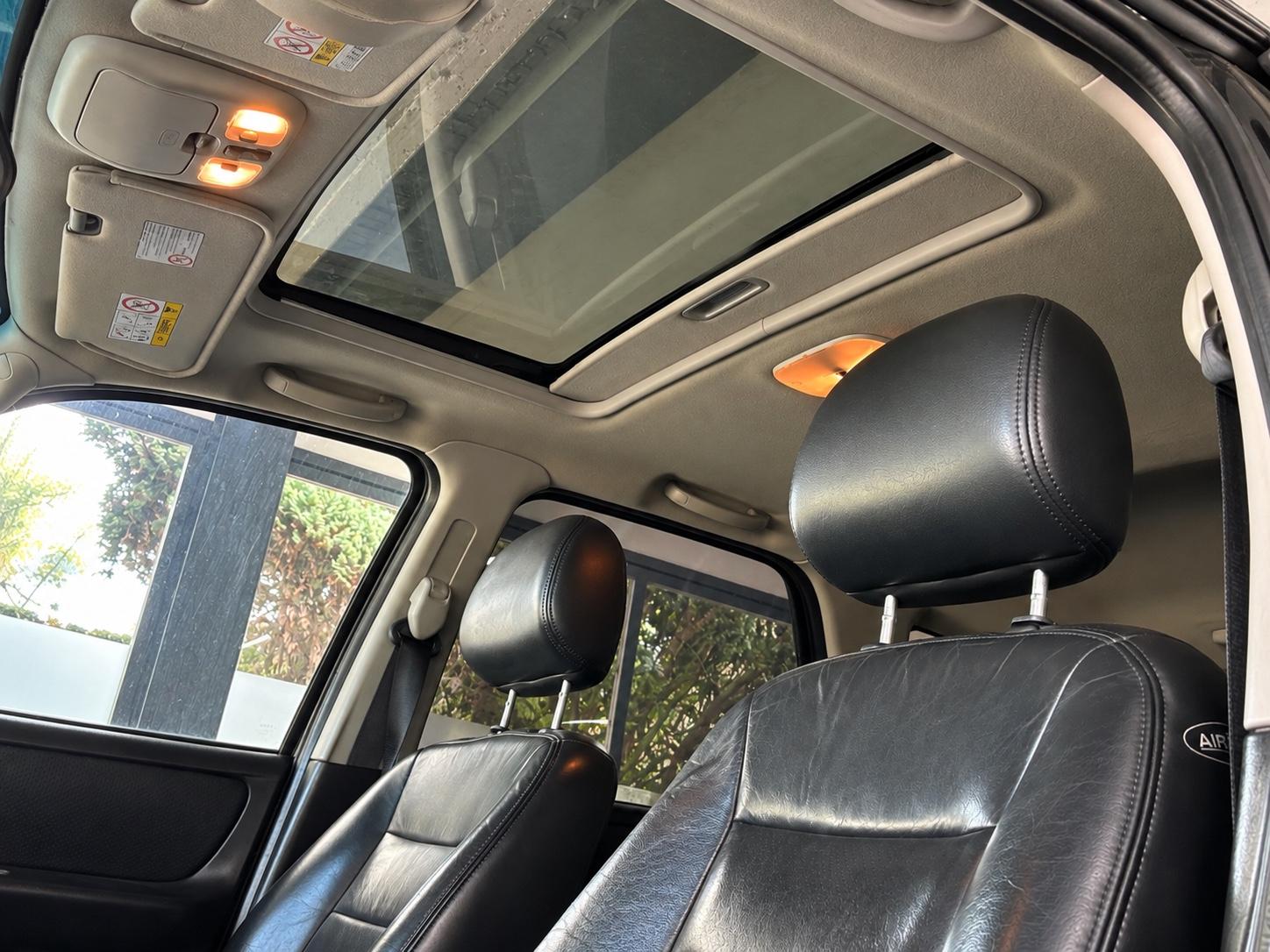 Ford Maverick 2004 — photo 11