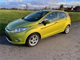 Ford Fiesta 1,25 60kW Titanium, SHZ, Bluetooth, Xenon - Ford Fiesta: Grün
