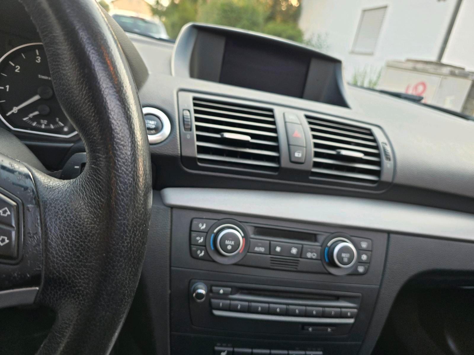 BMW 116 2009 — photo 14