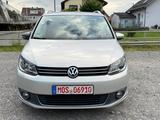 Volkswagen Touran Highline BMT SHZ*PDC*Navi*AHK*Kamera - Volkswagen Touran aus 2012