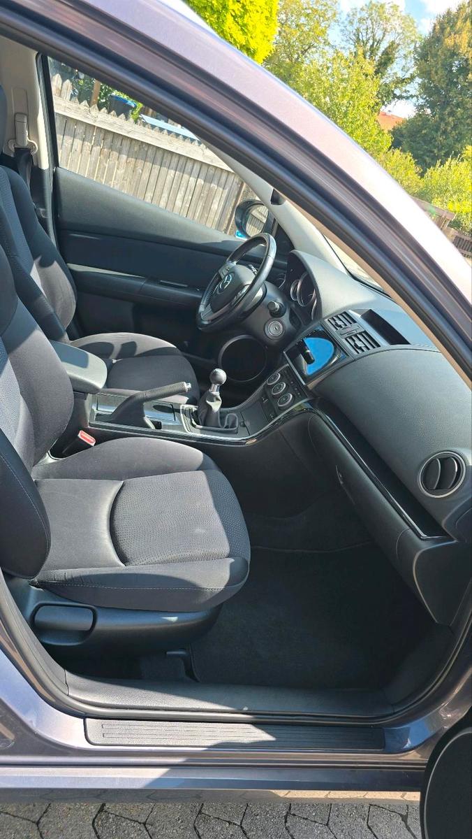 Mazda 2 2009 — photo 12