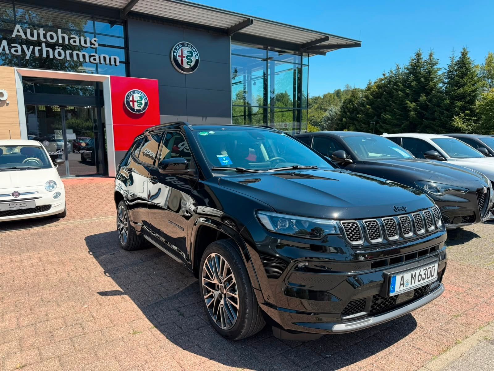 Fahrzeugabbildung Jeep Compass Summit Pano el. Sitz Leder Navi Mildhyb.