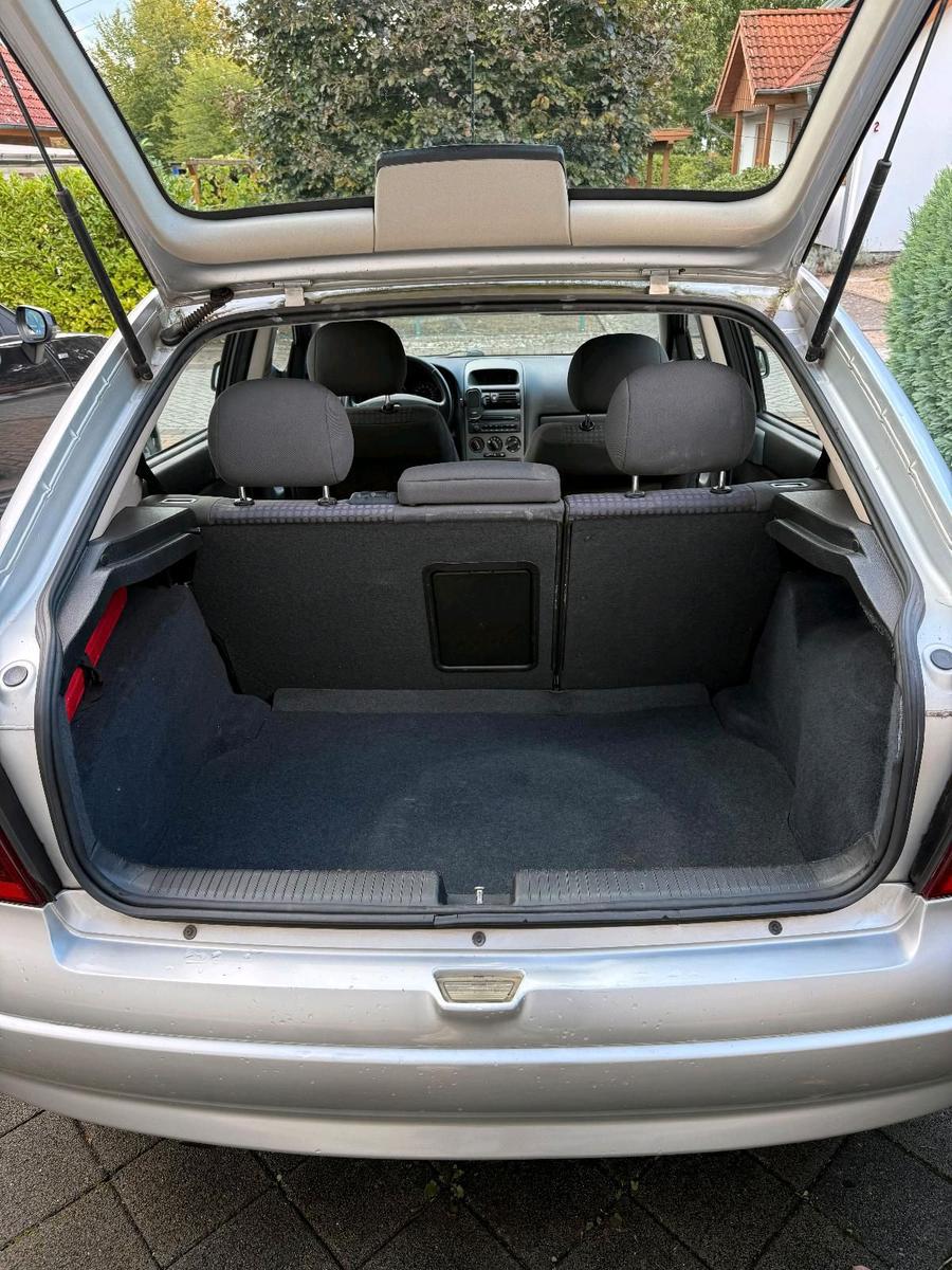 Opel Astra 2004 — photo 12