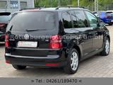Volkswagen Touran 1.4 TSI*UNITED*BI-XENON*NAVI*PDC*TEMPOMAT - gebrauchte VW Touran aus dem Jahr 2009