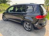 Volkswagen Touran 2.0 TDI SCR DSG SOUND AHK 7-Sitzer - VW Touran Gebrauchtwagen in Münster