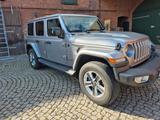 Jeep Wrangler 2.0 T-GDi Unlimited Sahara Automati... - silberne Jeep Wrangler