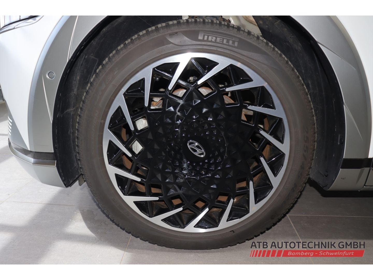 Fahrzeugabbildung Hyundai IONIQ 5 77,4 kWh UNIQ 4WD 98,9% SOH HUD Navi Sou