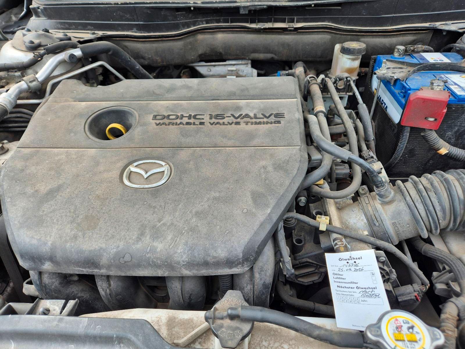 Mazda 2 2009 — photo 11