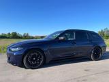 BMW M3 Touring Competion Tansanitblau metallic  - : Metallic Tansanitblau
